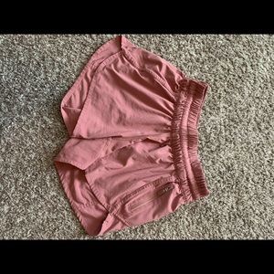 Mauve colored Lululemon tracker shorts